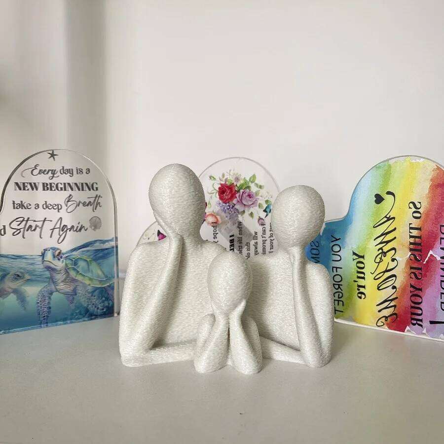 A family decorated wedding statue three people, perfect anniversary gift for husband and wife, newlyweds, or as an art