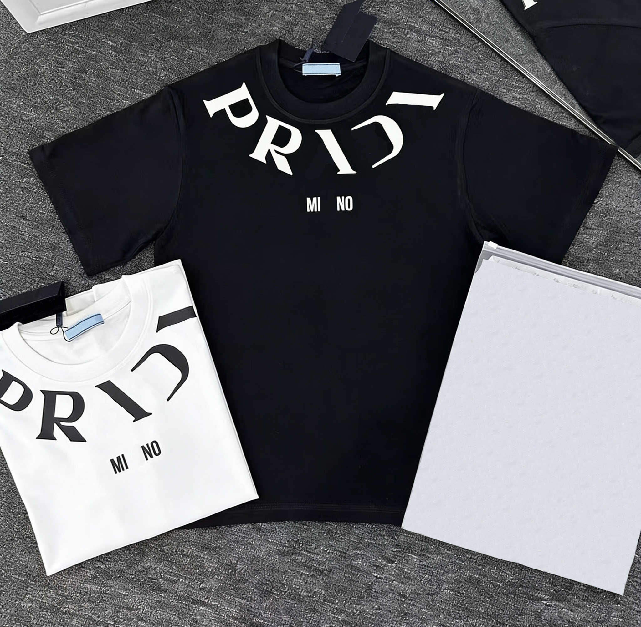 Summer new short-sleeved T-shirts, high-quality pure cotton short-sleeved men's fashionable shirts, women's simple black and white letter-printed casual T-shirts.