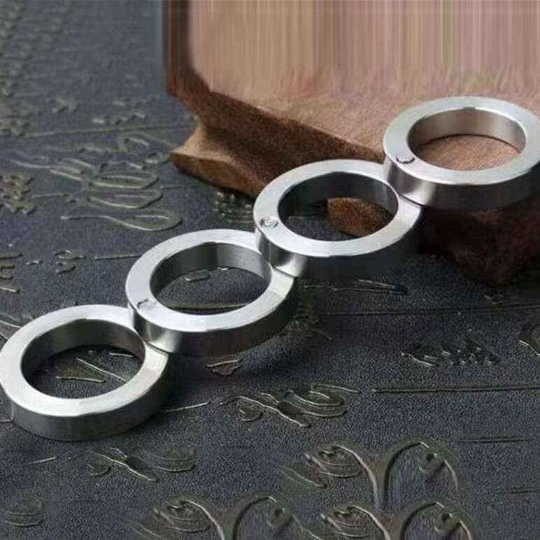 Outdoor stainless steel knuckles for self-defense; four-finger boxing buckle; iron fist hand support; finger guard for combat L260123