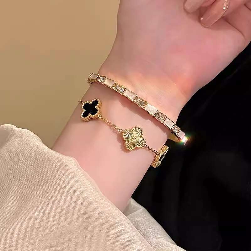 Black Gold Four-Leaf Clover Bracelet Women, Light Luxury Niche Exquisite Snake-Shaped Sparkling Diamond Flower Bangle High-End Feel New for 2026