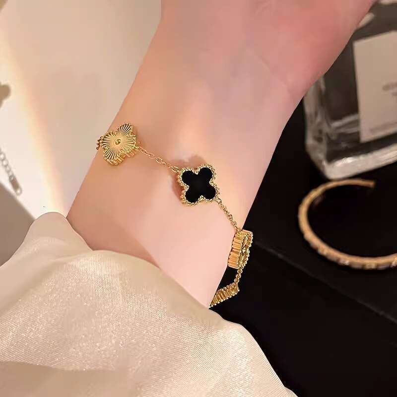 Black Gold Four-Leaf Clover Bracelet Women, Light Luxury Niche Exquisite Snake-Shaped Sparkling Diamond Flower Bangle High-End Feel New for 2026