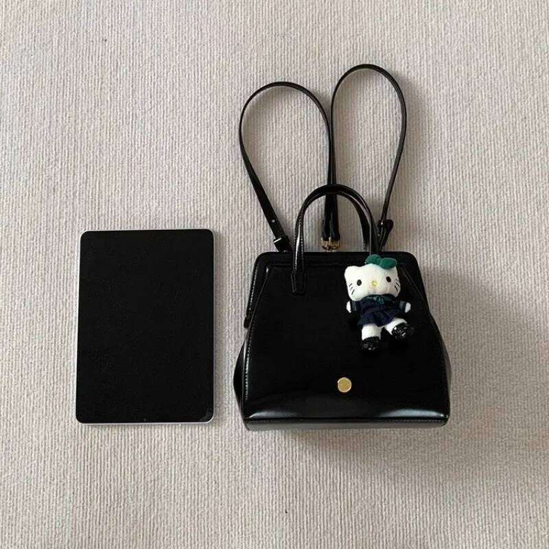 Autumn and winter women's bags clip niche retro black backpacks trendy handbags Z260124