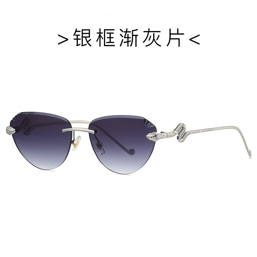 New Cat Eye Rimless Sunglasses 2026 European And American Style Cut Edge Fashion Snake Head Sunglasses For Women Luxury Fashion Eyewear UV Protection 