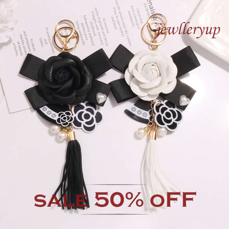 Tassel keychain Camellia flower bow pendant A fashionable accessory for commuting and dating