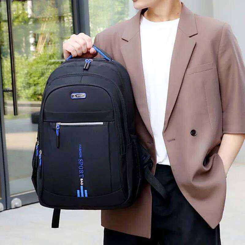 Spring new male leisure business travel backpack Large capacity junior high school female computer men's bag Z260124