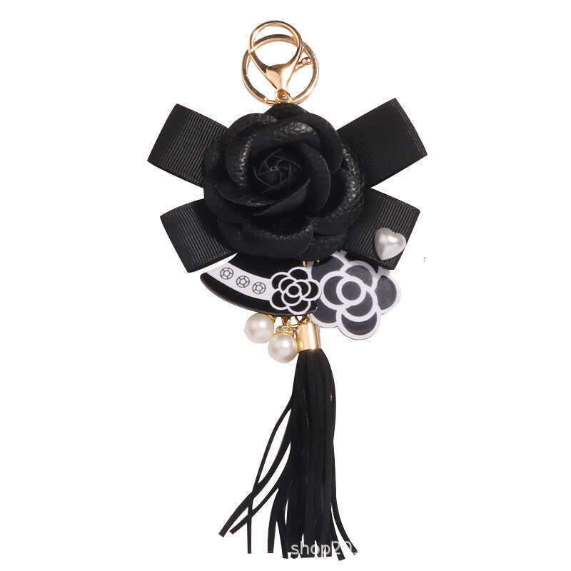 Tassel keychain Camellia flower bow pendant A fashionable accessory for commuting and dating