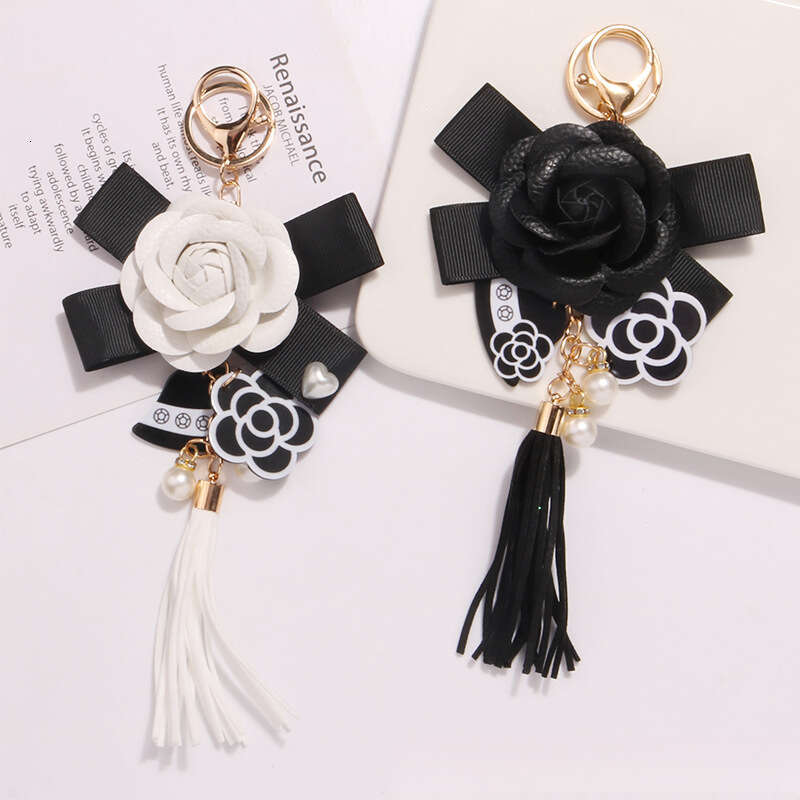 Tassel keychain Camellia flower bow pendant A fashionable accessory for commuting and dating