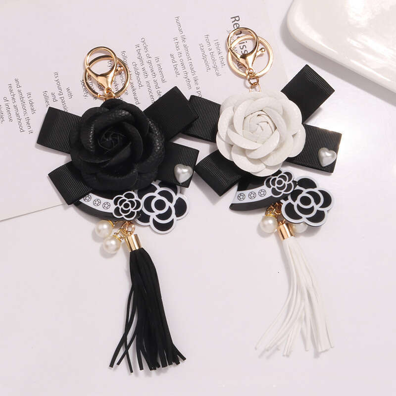 Tassel keychain Camellia flower bow pendant A fashionable accessory for commuting and dating