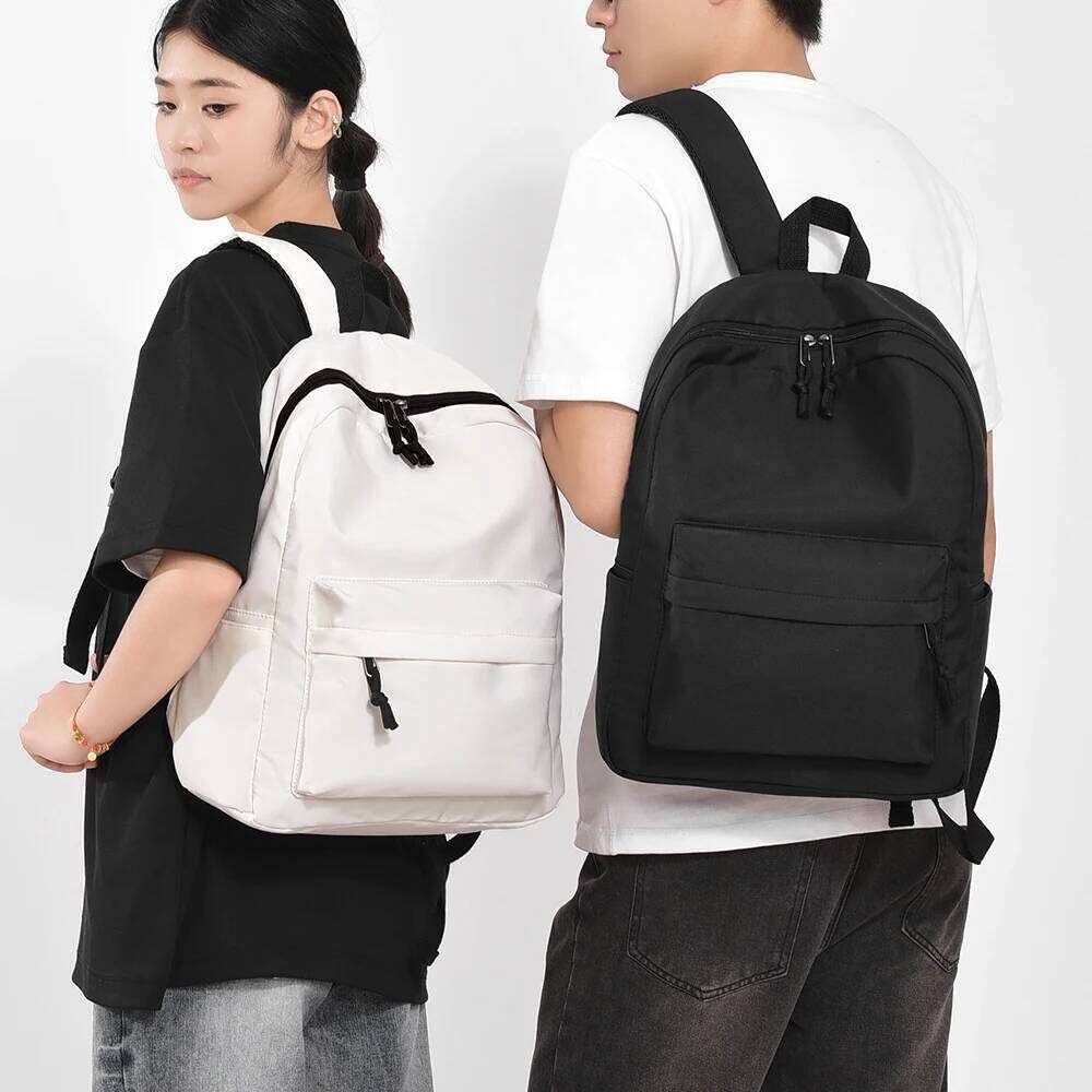 A stylish travel backpack with ample capacity, lightweight nylon fabric versatile multiple pockets for school and commuting. Z260124