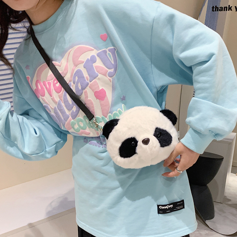 Cute toy panda doll style shoulder bag, suitable for children to use. This cross disciplinary design plush bear gift