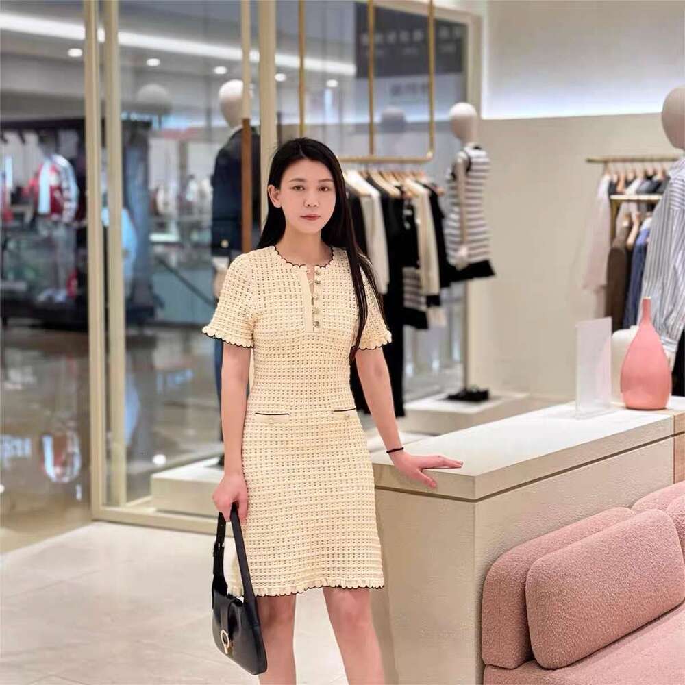 2026 Spring/Summer New French Elegant Style Wave Neck Short Sleeve Crochet Hollow Knitted Women's Dress