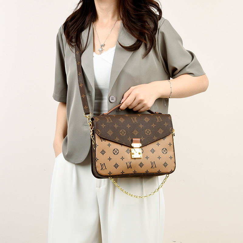 2026 OULAIMEIZI Light luxury vintage women's small square handbag style K-letter shoulder crossbody bag for women