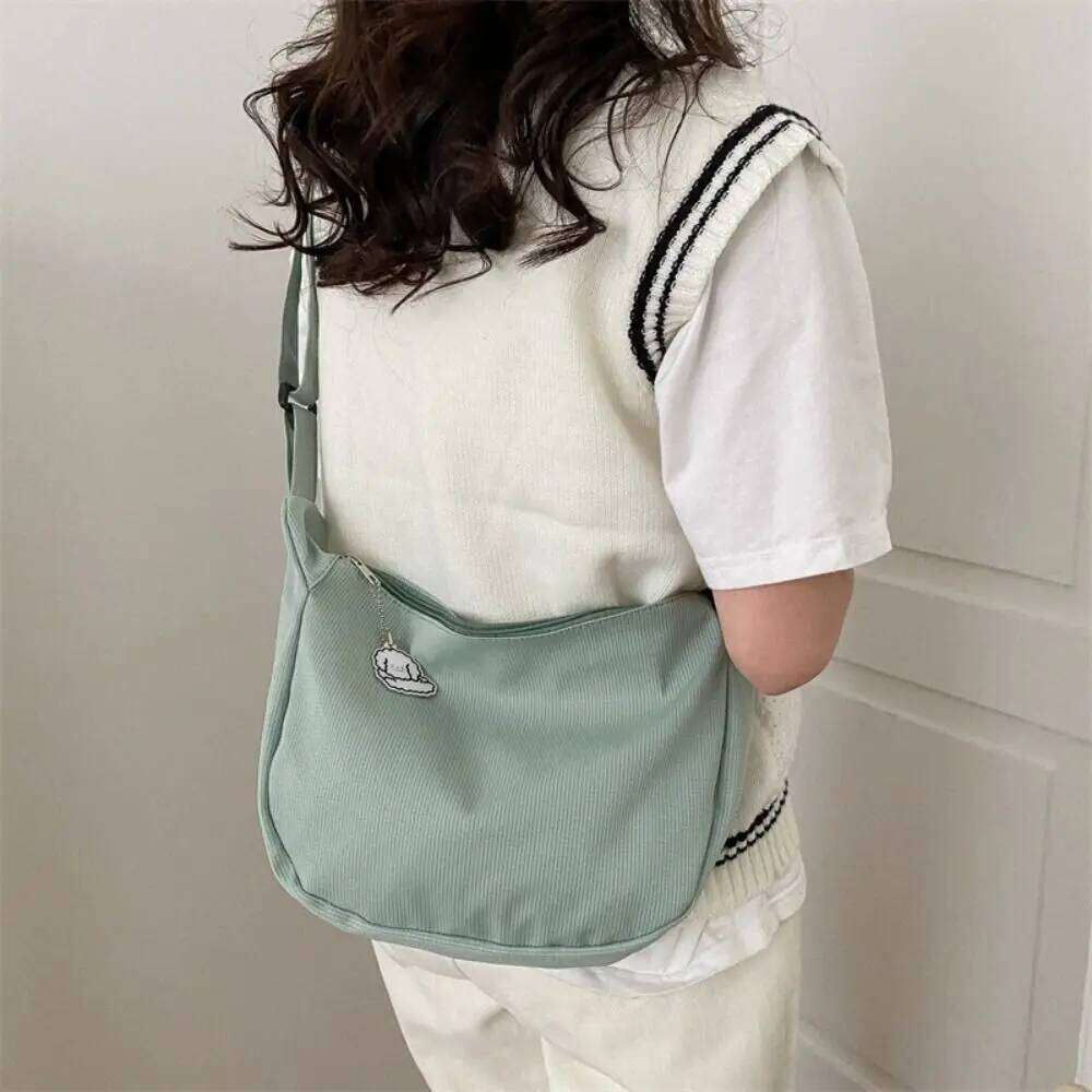 Korean Style Lightweight Shoulder Cream Solid Color Canvas with Pendant Handbag Messenger Simple Dumpling Bag XJ260125