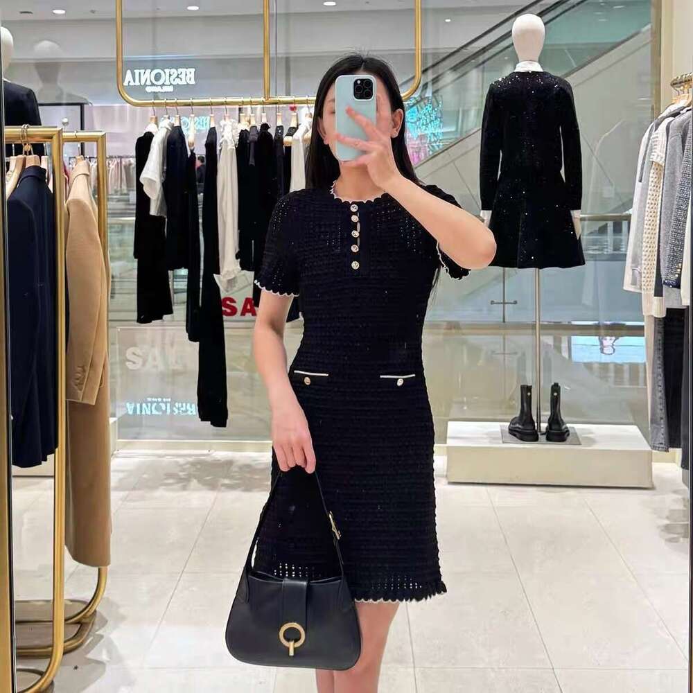 2026 Spring/Summer New French Elegant Style Wave Neck Short Sleeve Crochet Hollow Knitted Women's Dress