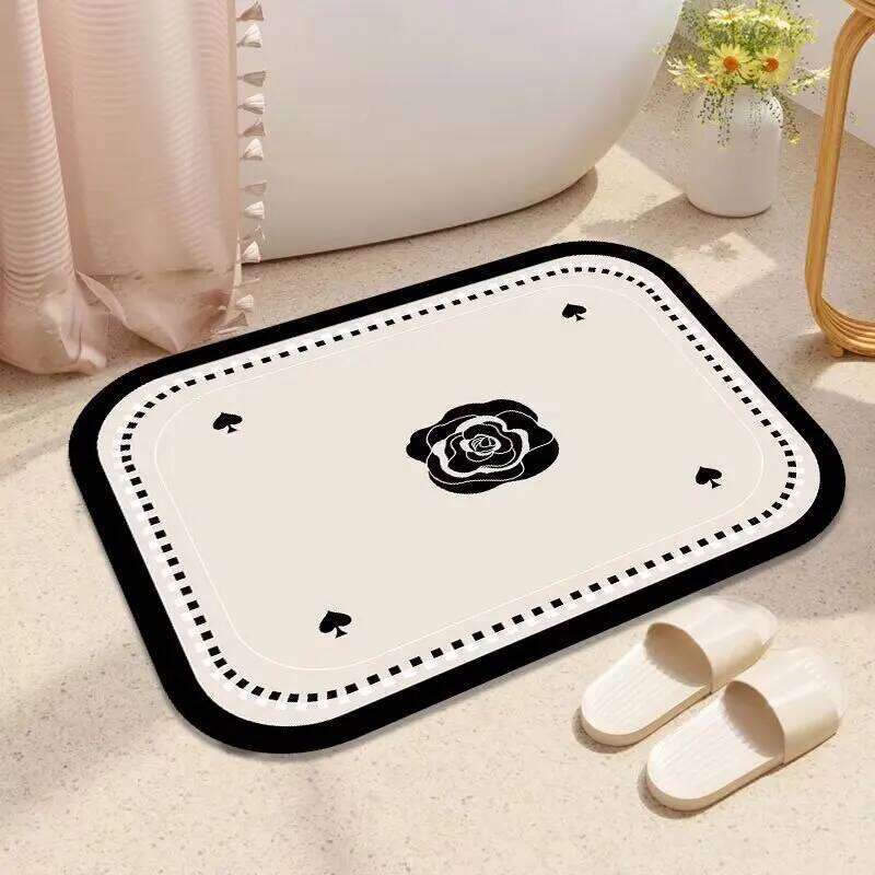 Bathroom diatom mud, water-absorbing non-slip mat, toilet, bathroom entry door, toilet floor mat