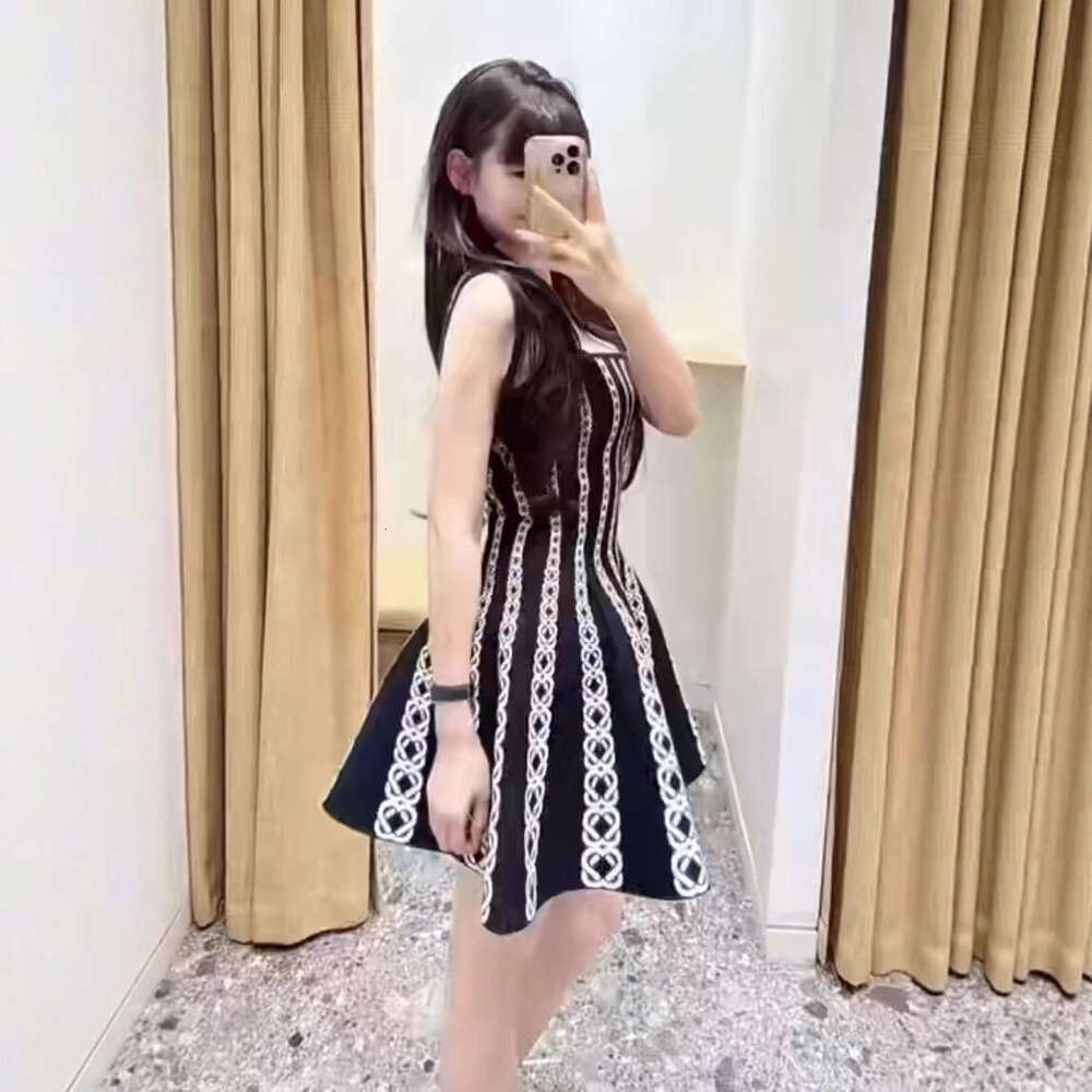 2026 Autumn New French Elegant Designer Jacquard Striped Sleeveless Belt Knitted Dress for Children