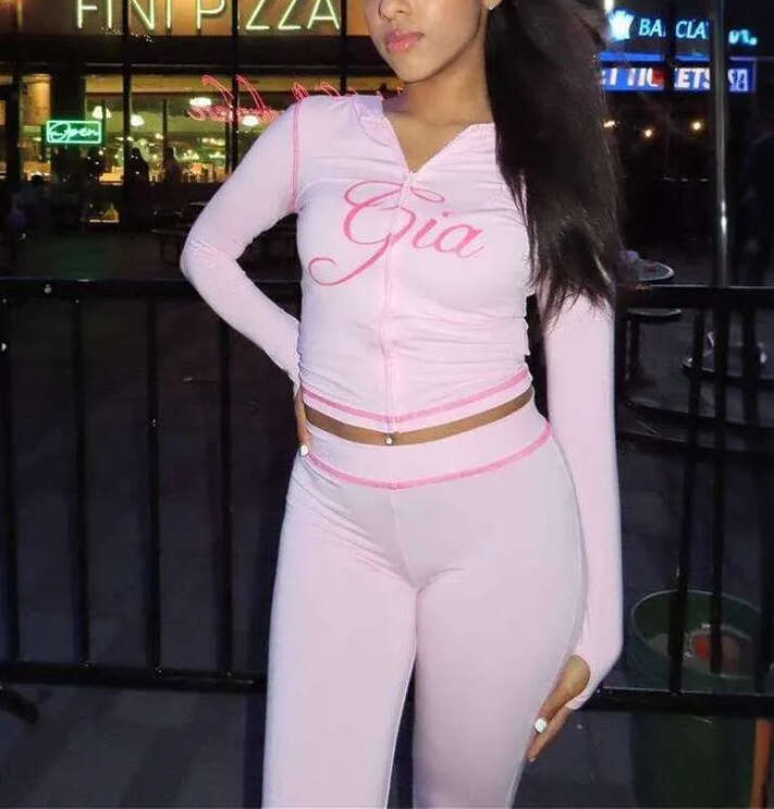 2026 designer women's high sportswear style 2-piece set with flared pants, long sleeved top, low waist set