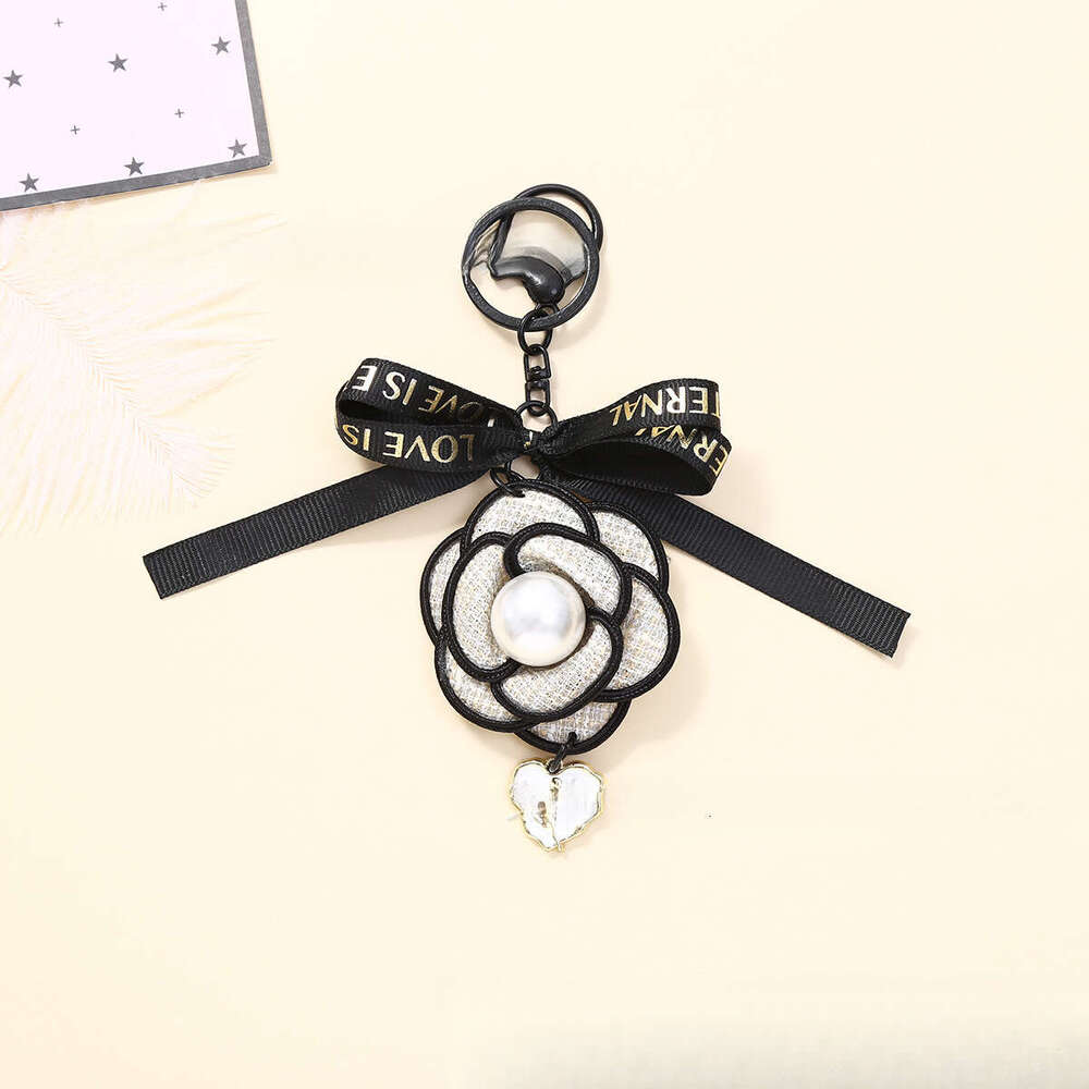 Ribbons and bow keychain Sweet heart pendant An accessory with the style of Xiao Xiangfeng
