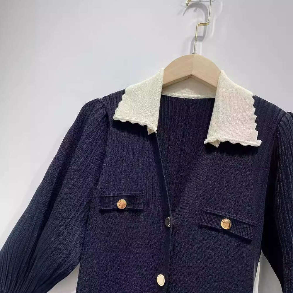 2026 Spring/Summer New Color blocked V-neck Fluffy Single breasted Short Sleeve Solid Color Knitted Dress for Women