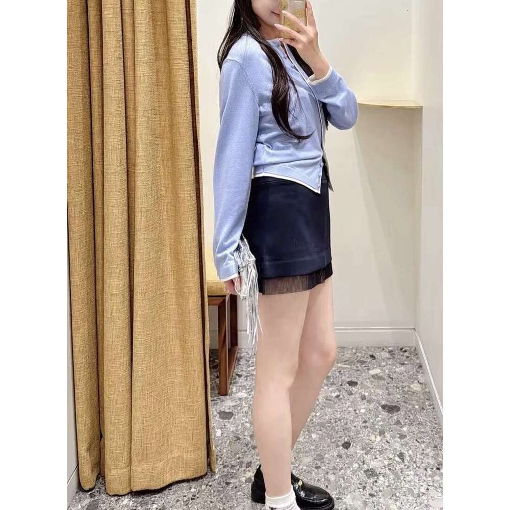 New French elegant and sweet style rhinestone single breasted knitted women's cardigan top for early autumn 2026