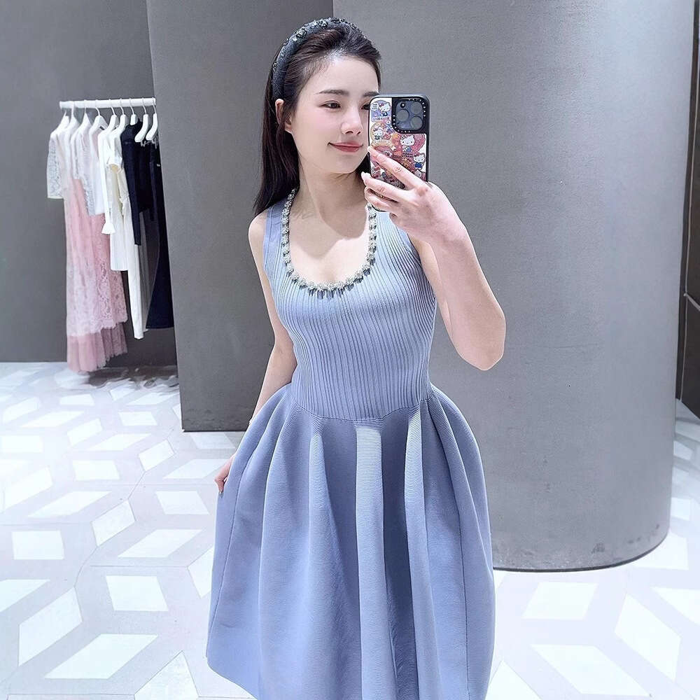 2026 spring French niche elegant temperament designer style rhinestone belt ribbed knit vest dress for women