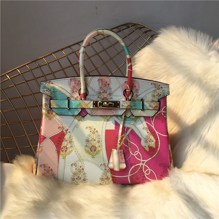 Designer's new platinum painted top layer cowhide togo single shoulder diagonal cross hand-held women's bag luxury bag