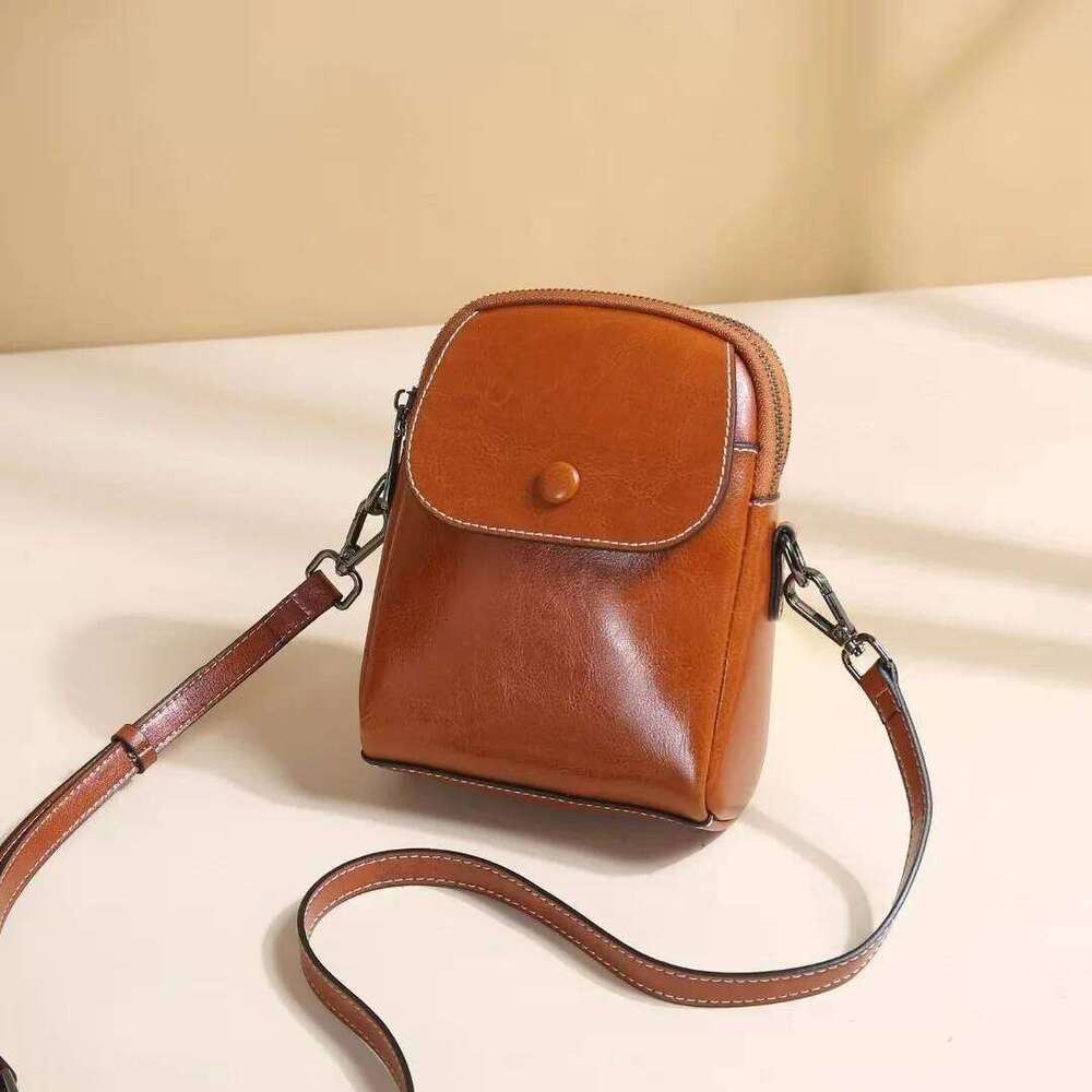 Ladies real leather high-end shoulder bag retro square flip phone storage diagonal cross commuting small backpack XJ260125