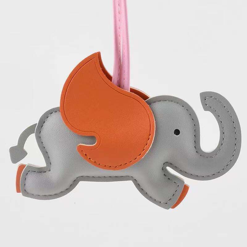 In Stock Dumbo Keychain Bag Accessory 4inch PU Leather Pendant Multiple Colors Available Wholesale S260126