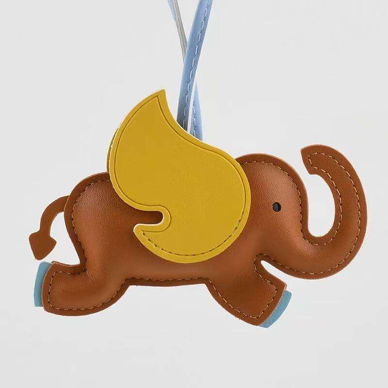 In Stock Lucky Leather Creative Backpack Car Keychain Cute Flying Elephant Pendant Large Quantity Good Price S260126