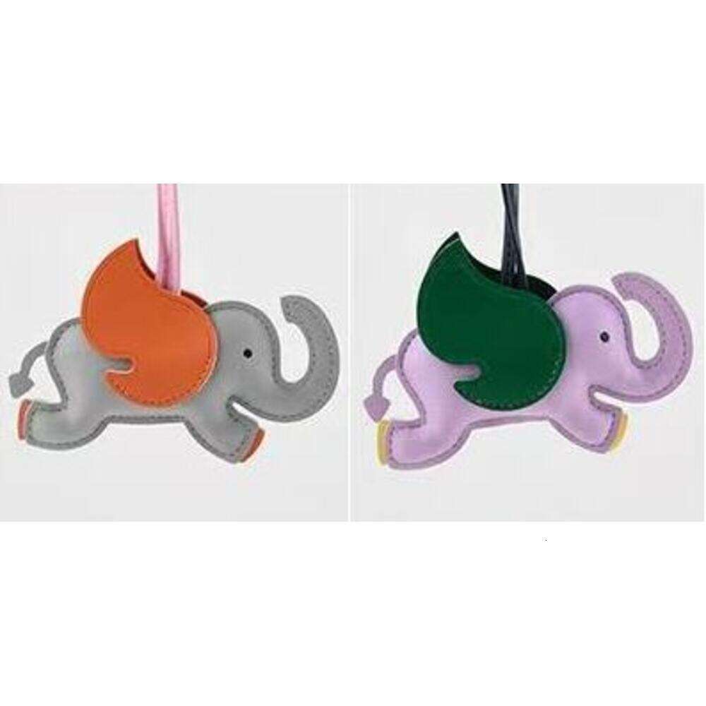 In Stock Lucky Leather Creative Backpack Car Keychain Cute Flying Elephant Pendant Large Quantity Good Price S260126