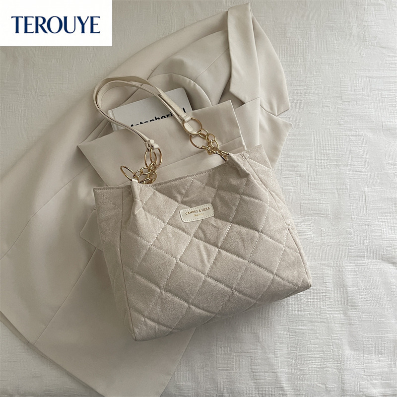 TEROUYE Fashionable large capacity women's handbag autumn and winter heart Amen casual quilted embroidered shoulder bag trendy luxury