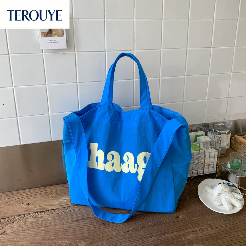 TEROUYE autumn bag and winter new Korean letter simple style niche design fashionable large capacity canvas bag women's shoulder bag