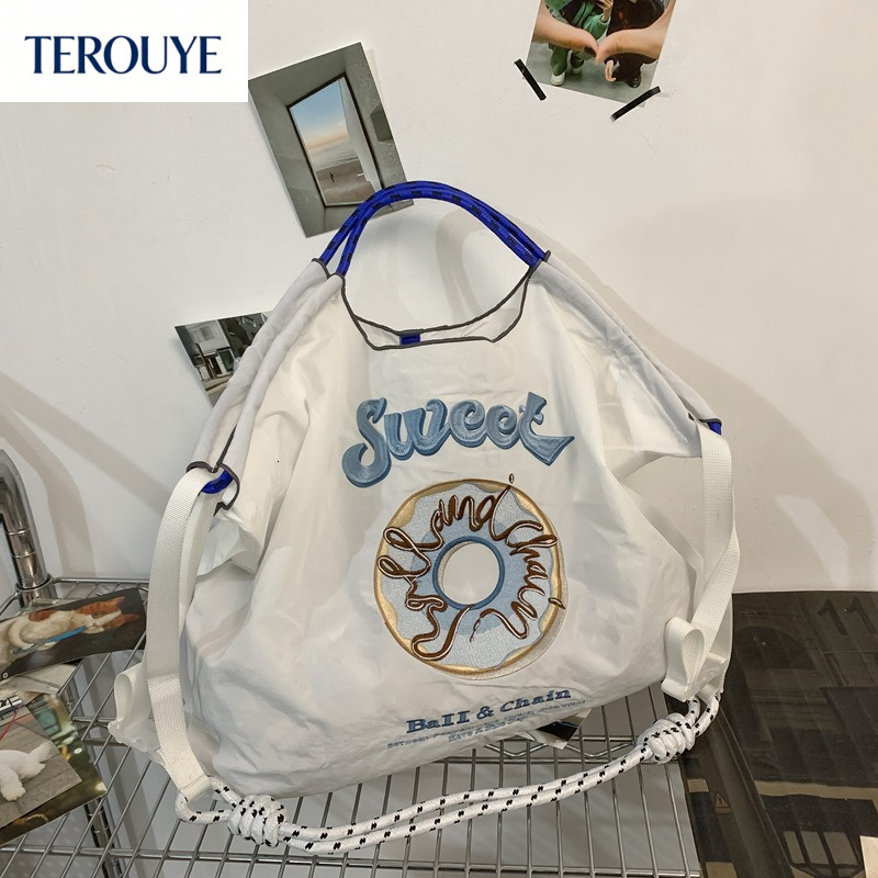 TEROUYE Autumn and winter new Japanese style niche embroidery shopping bag nylon fashionable simple style handbag women's shoulder bag
