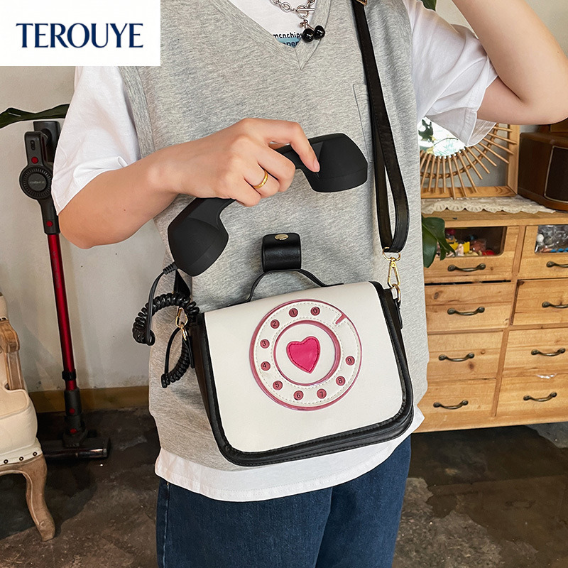 TEROUYE Autumn/Winter bag New Women's Fashion Phone Bag bag Personalized European and American Fashion Creative Shoulder Bag