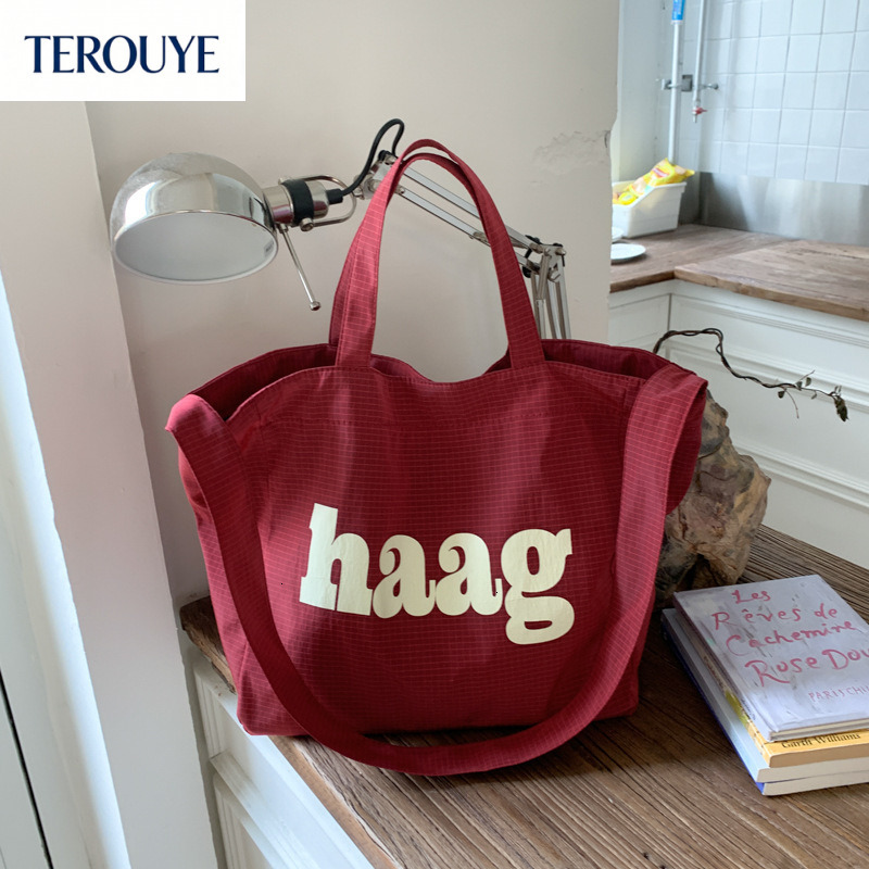 TEROUYE autumn bag and winter new Korean letter simple style niche design fashionable large capacity canvas bag women's shoulder bag
