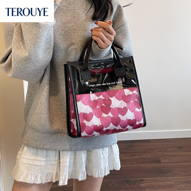 TEROUYE autumn and winter new Korean color block niche design simple style bag heart pattern fashionable women's handbag