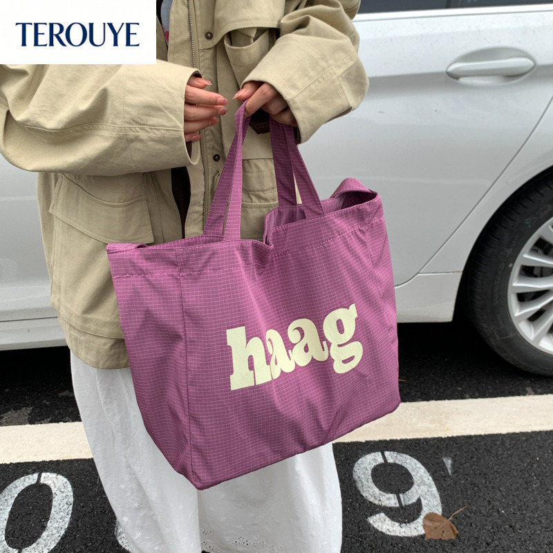 TEROUYE autumn bag and winter new Korean letter simple style niche design fashionable large capacity canvas bag women's shoulder bag