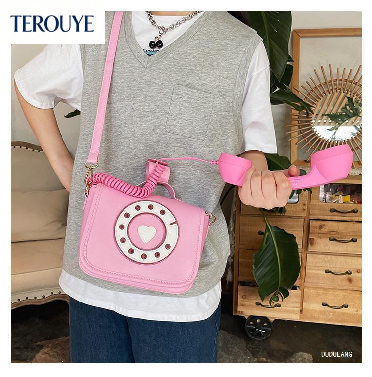 TEROUYE Autumn/Winter bag New Women's Fashion Phone Bag bag Personalized European and American Fashion Creative Shoulder Bag