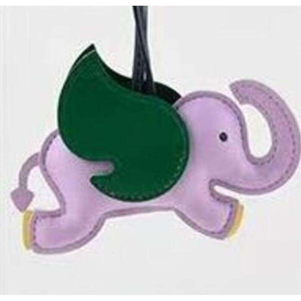 In Stock Lucky Leather Creative Backpack Car Keychain Cute Flying Elephant Pendant Large Quantity Good Price S260126