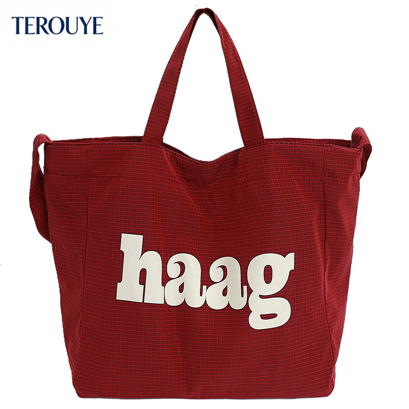 TEROUYE autumn bag and winter new Korean letter simple style niche design fashionable large capacity canvas bag women's shoulder bag