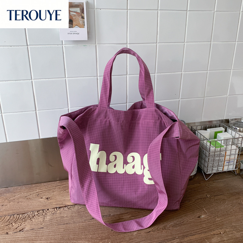 TEROUYE autumn bag and winter new Korean letter simple style niche design fashionable large capacity canvas bag women's shoulder bag