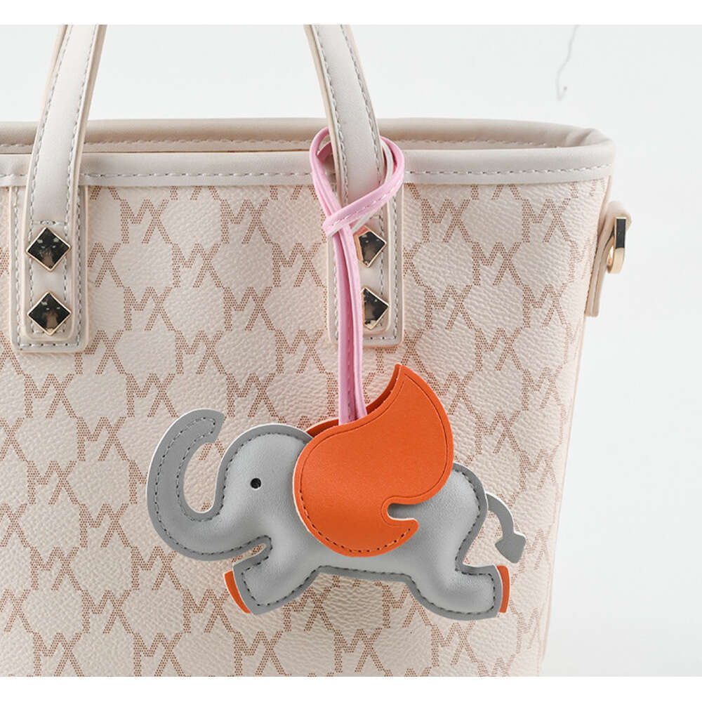 Mascot Leather Creative Backpack Car Keychain 3D Cute Flying Elephant Pendant Christmas Gift S260126 117