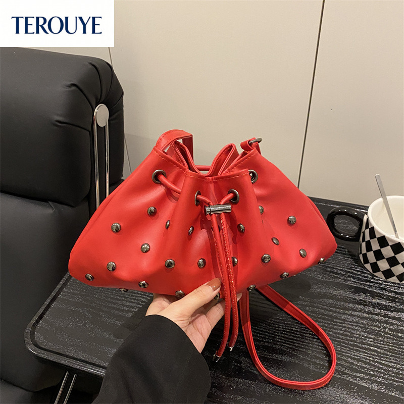 TEROUYE European and American fashion Y2K style rivet hollow armpit bag autumn and winter new trend drawstring design women's handbag elegant lux