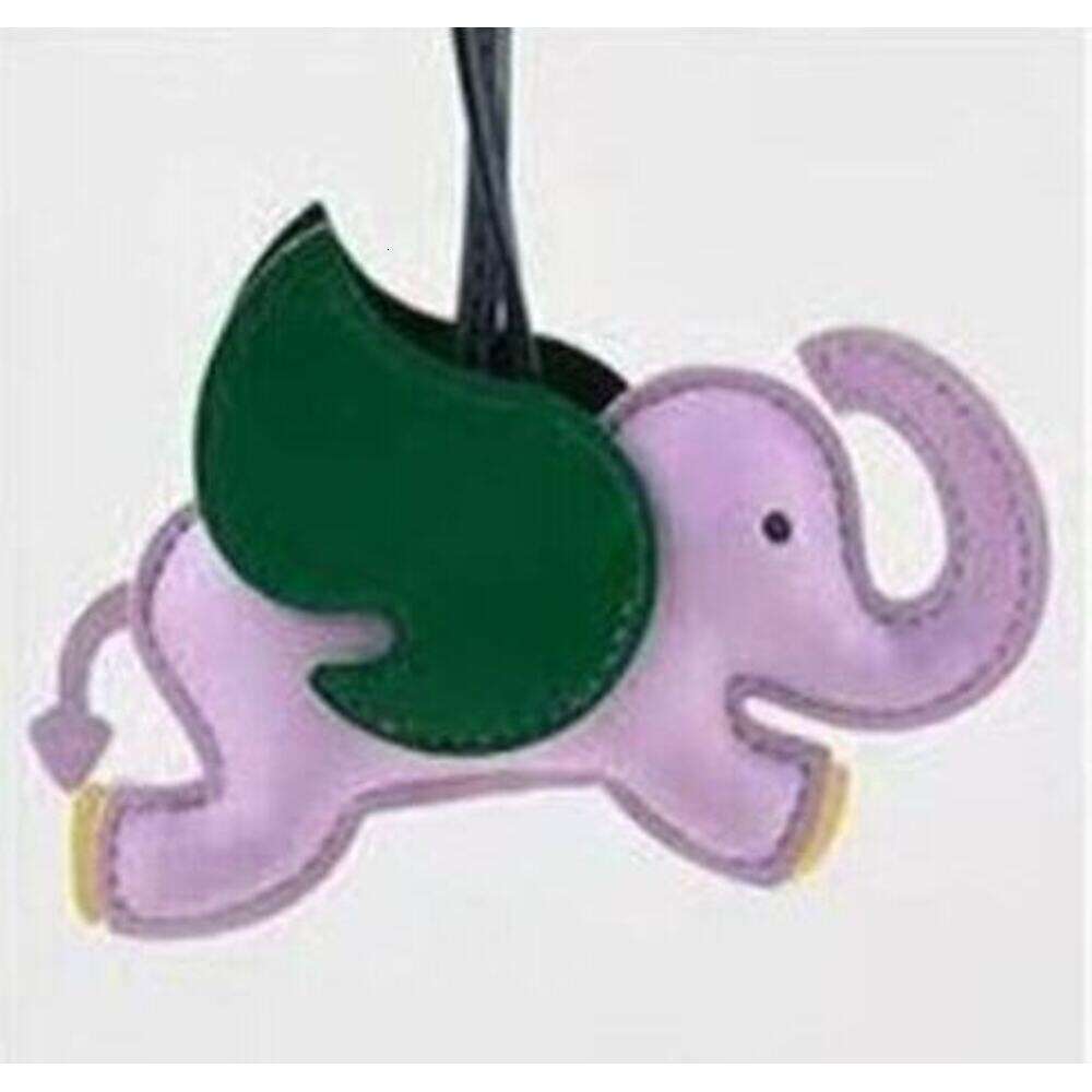 Mascot Leather Creative Backpack Car Flying Elephant Pendant Minimalist Bag Keychain S260126