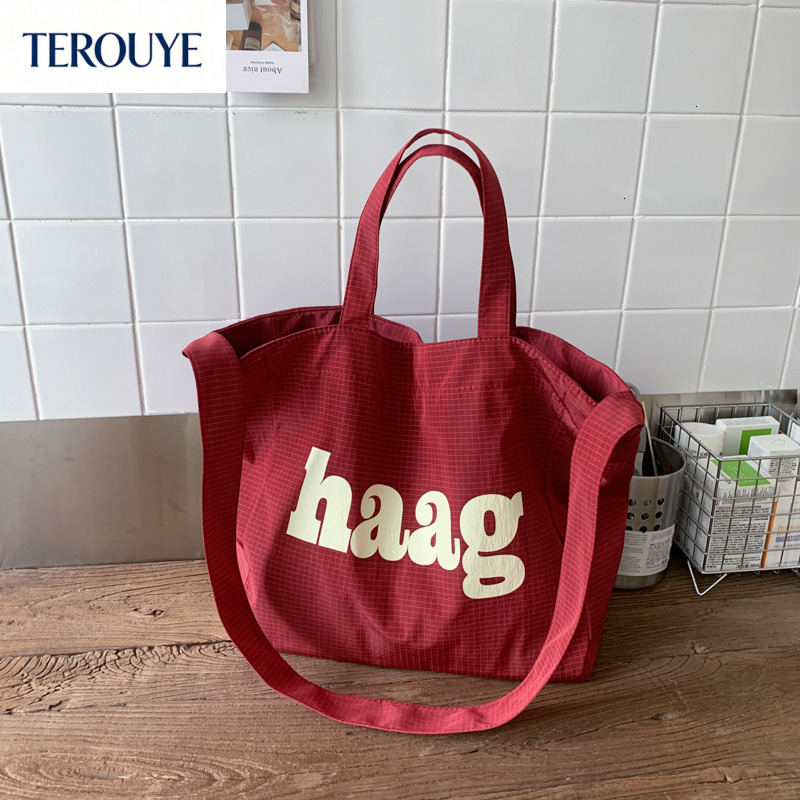 TEROUYE autumn bag and winter new Korean letter simple style niche design fashionable large capacity canvas bag women's shoulder bag