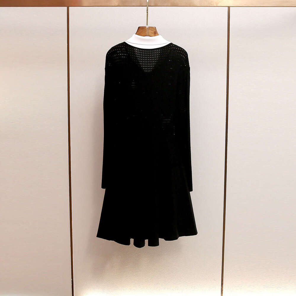 2026 autumn and winter new French style small fragrance color blocked lapel fake two-piece waistline patch long sleeved knitted women's dress