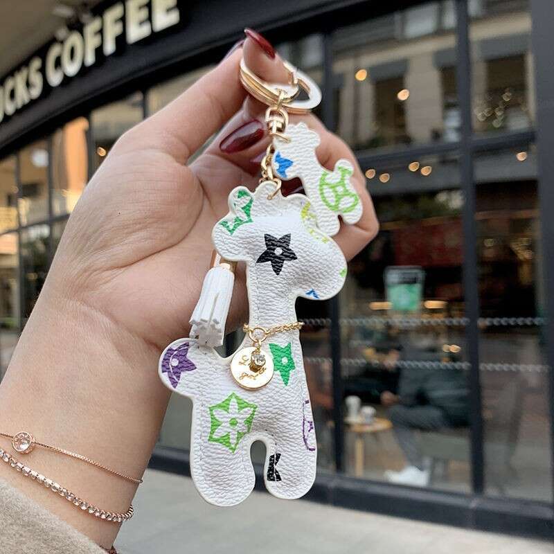 designer Keychain Bag Charm Checkered Giraffe Leather Pendant with Fur Ball Tassel Retro Accessory for Couples Gifting