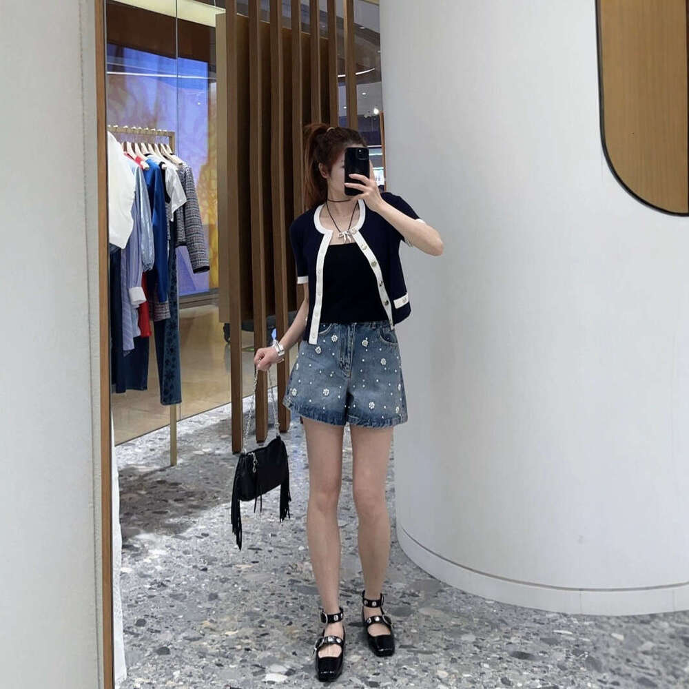 2026 summer new women's clothing color block style metal button decoration slim fit short sleeved knitted cardigan top
