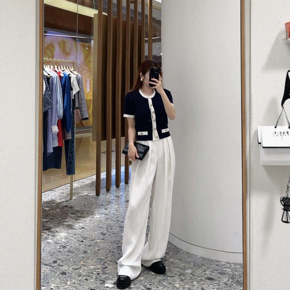 2026 summer new women's clothing color block style metal button decoration slim fit short sleeved knitted cardigan top