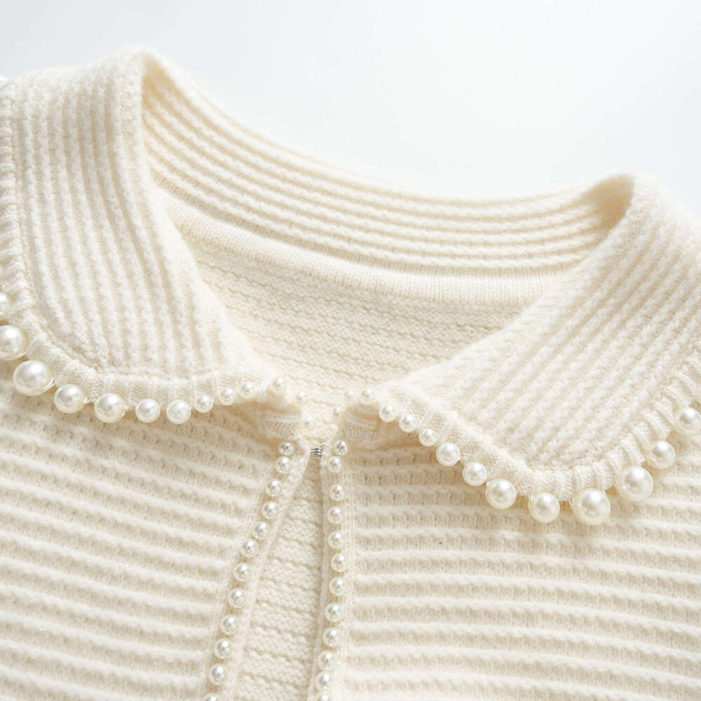 2026 autumn new designer retro pearl decoration doll collar elegant versatile knitted cardigan jacket